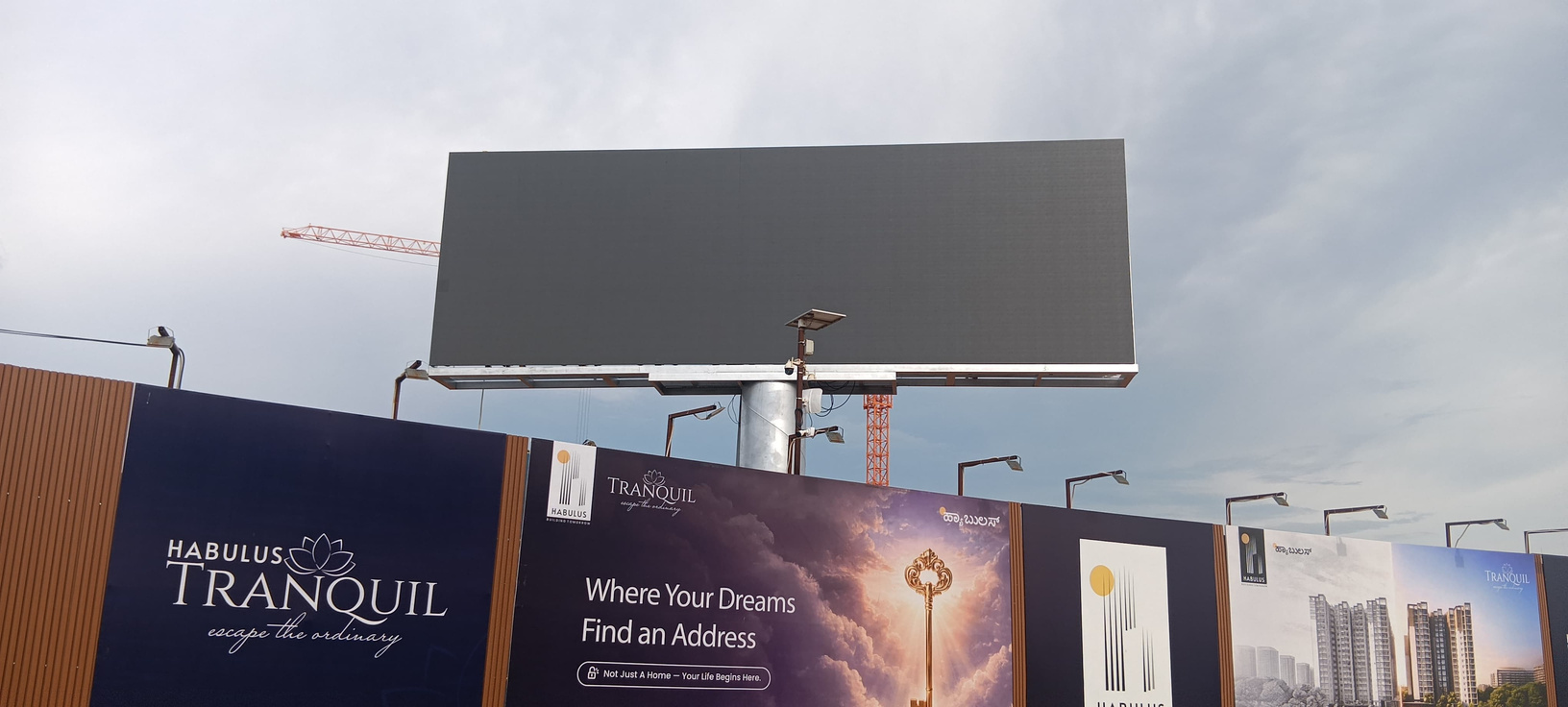 Large outdoor LED façade lit at dusk